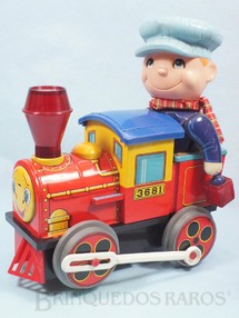 Brinquedos Antigos - Modern Toys e Masudaya Toys - Locomotiva com Boneco Sistema Bate e Volta boneco com movimento na cabeça e no braço acende a Chaminé e a Lanterna 26,00 cm de altura Década de 1970