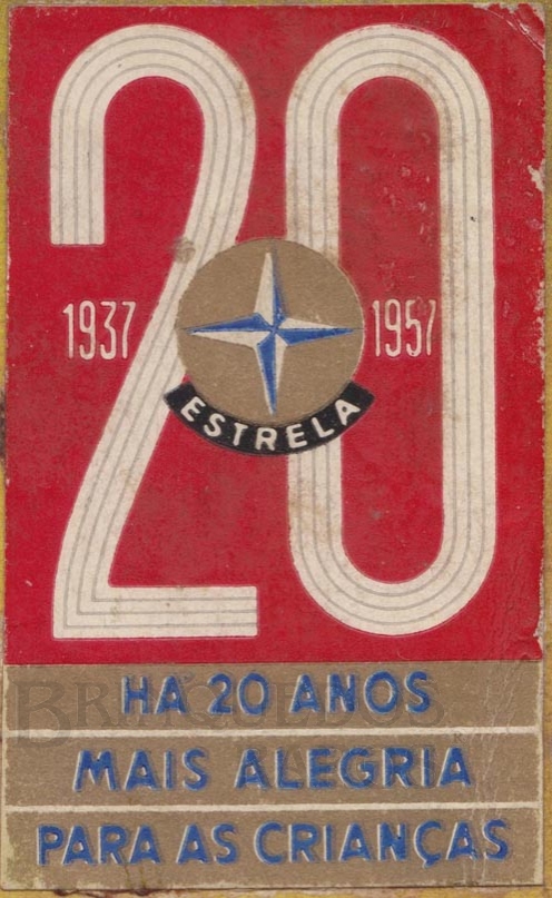 Brinquedo antigo Estrela Etiqueta auto adesiva Comemorativa dos 20 anos Colada nos impressos da Fábrica no Ano 1957