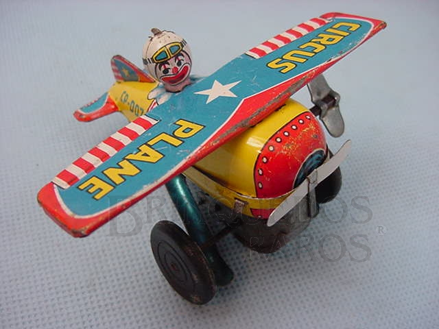 Brinquedo antigo Avião de acrobacias Circus Plane com palhaço