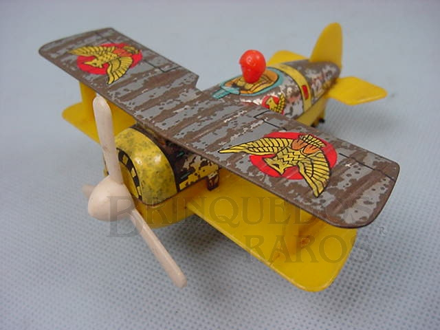 Brinquedo antigo Avião biplano de lata e plastico