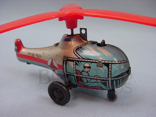 Brinquedo antigo Helicoptero prateado e azul Década de 1960