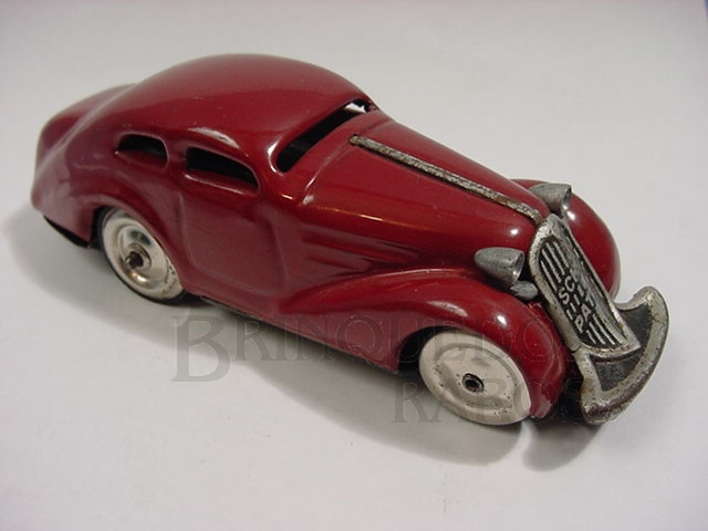 Brinquedo antigo Sedan Schuco Patente vinho Made in US Zone Década de 1950