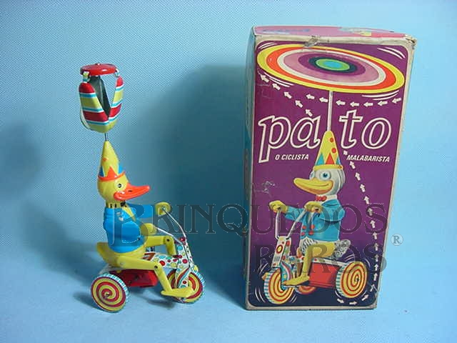 Brinquedo antigo Pato o Ciclista Malabarista Década de 1960