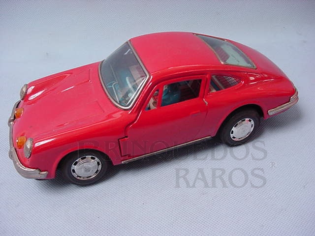 Brinquedo antigo Porsche 911 com 27,00 cm de comprimento Sistema Bate e Volta abre as portas automaticamente Década de 1970
