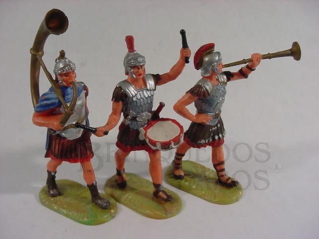 Brinquedo antigo Conjunto de tres soldados romanos em banda