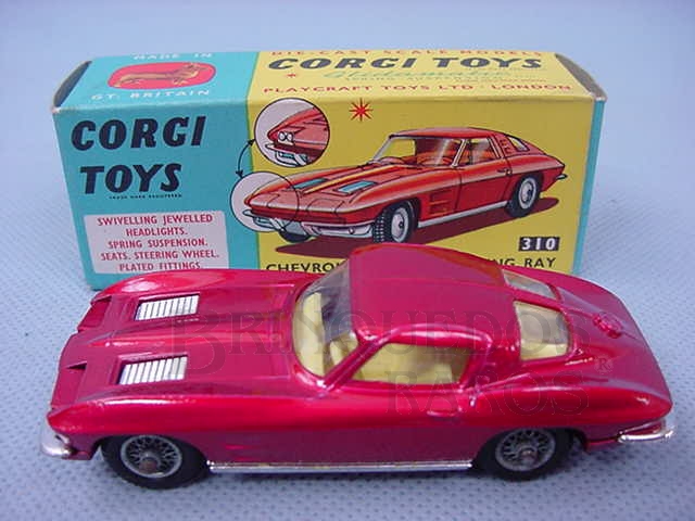 Brinquedo antigo Chevrolet Corvette Sting Ray vermelho metálico