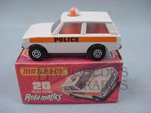 Brinquedo antigo Police Patrol Rola-Matics orange interior