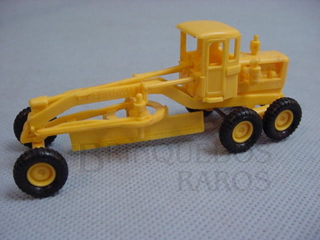 Brinquedo antigo Motoniveladora Caterpillar com cabine 10,00 cm de comprimento Década de 1960