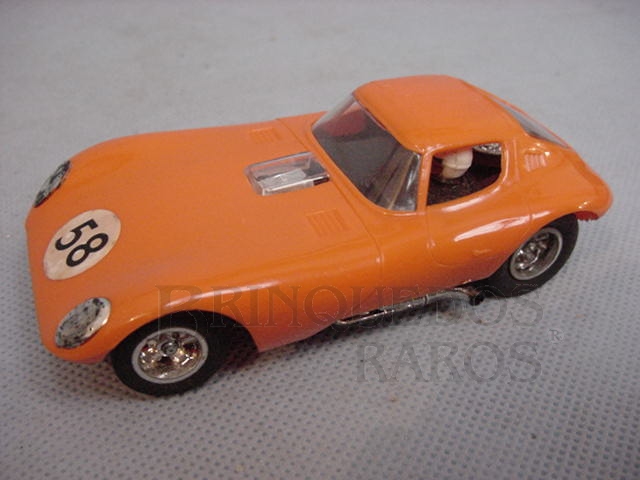 Brinquedo antigo Cheetah GT laranja com chassi de plástico Década de 1970