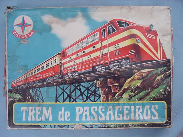 Brinquedo antigo Caixa do Conjunto Trem de Passageiros fabricado em 1970 pela Estrela Brasil Trabalho assinado pelo artista Manolo 