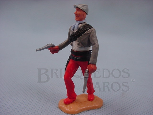 Brinquedo antigo Soldado Confederado a pé com dois revolveres