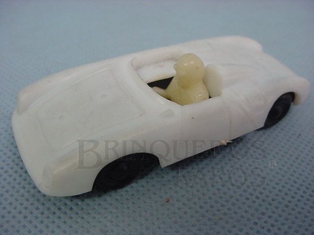 Brinquedo antigo Porsche Spyder com piloto