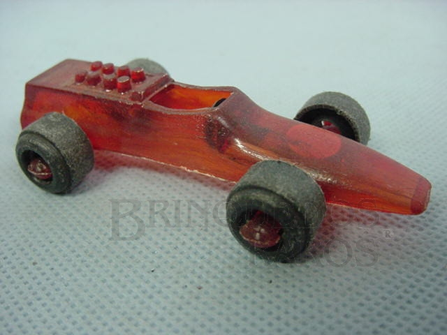 Brinquedo antigo Formula 1 vermelho transparente Década de 1970