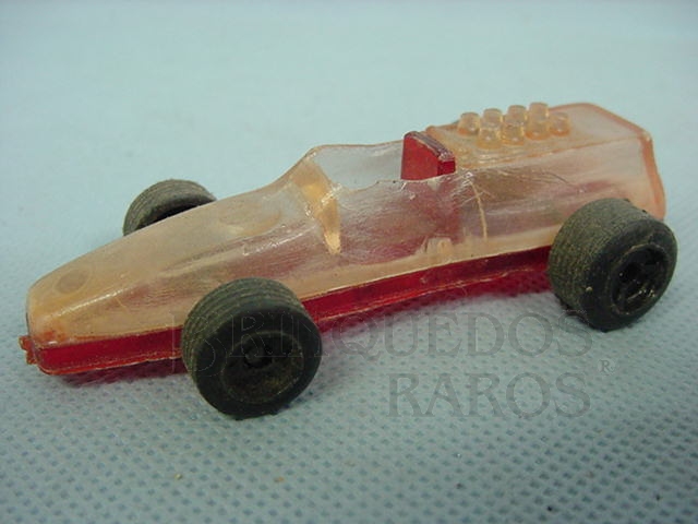 Brinquedo antigo Formula 1 vermelho e branco transparente Década de 1970