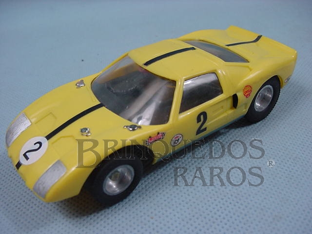 Brinquedo antigo Ford GT amarelo