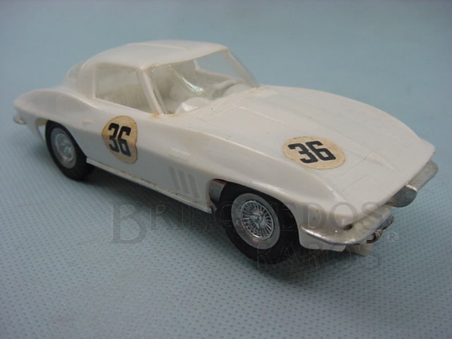 Brinquedo antigo Corvette Sting Ray 1965 branca versão home