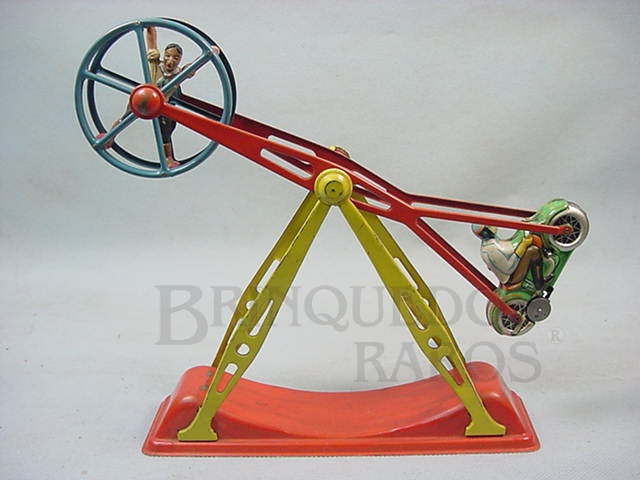 Brinquedo antigo Torre com Motocicleta e Acróbata 28,00 cm de altura Década de 1950

