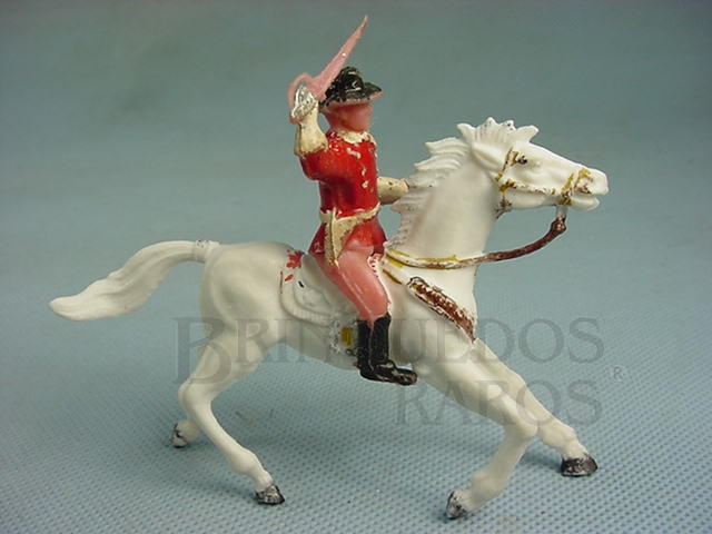 Brinquedo antigo Coronel da Sétima Cavalaria montado a cavalo com sabre Uniforme vermelho Casablanca Década de 1960