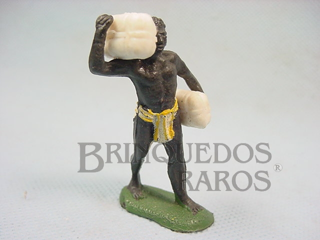 Brinquedo antigo Nativo Carregador com dois pacotes Série Safari na África Década de 1970