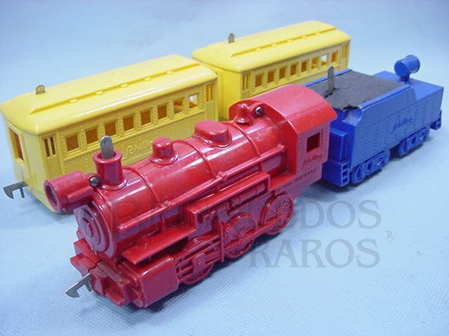 Brinquedo antigo Conjunto com locomotiva a vapor e dois Carros de Passageiros Importado e distribuído pela Estrela Ano 1948