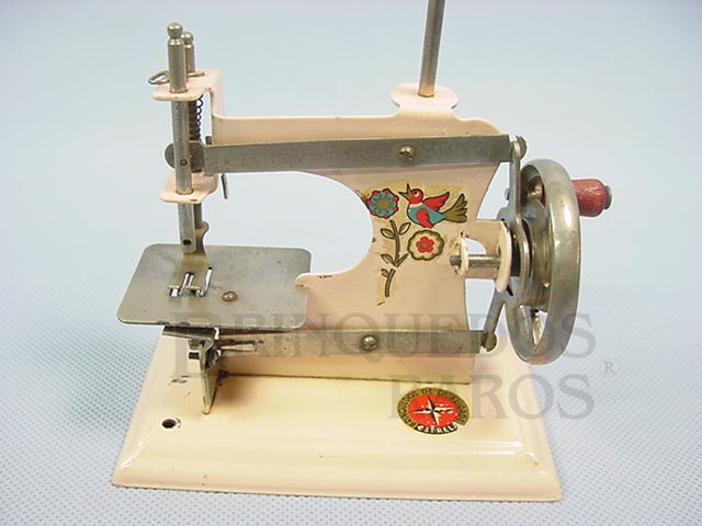 Brinquedo antigo Máquina de costura com 12,00 cm de altura Década de 1940