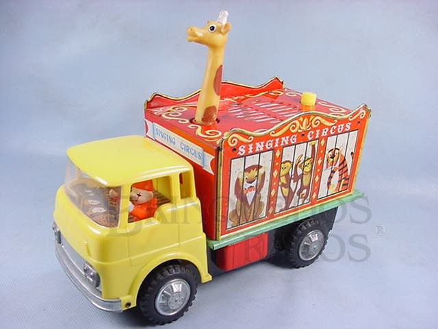 Brinquedo antigo Caminhão Singing Circus com Girafa Dispositivo à pilha com som de Circo 27,00 cm de comprimento Década de 1970