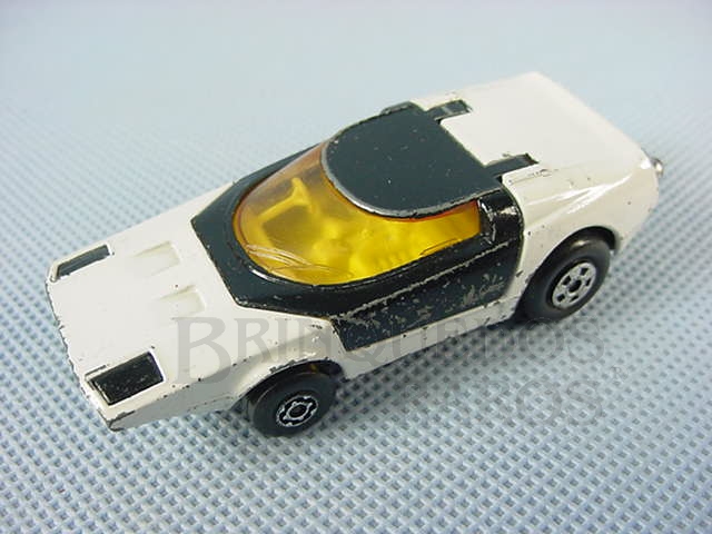 Brinquedo antigo Clipper branco com capota preta Brazilian Matchbox Rola-Matics Inbrima 1970
