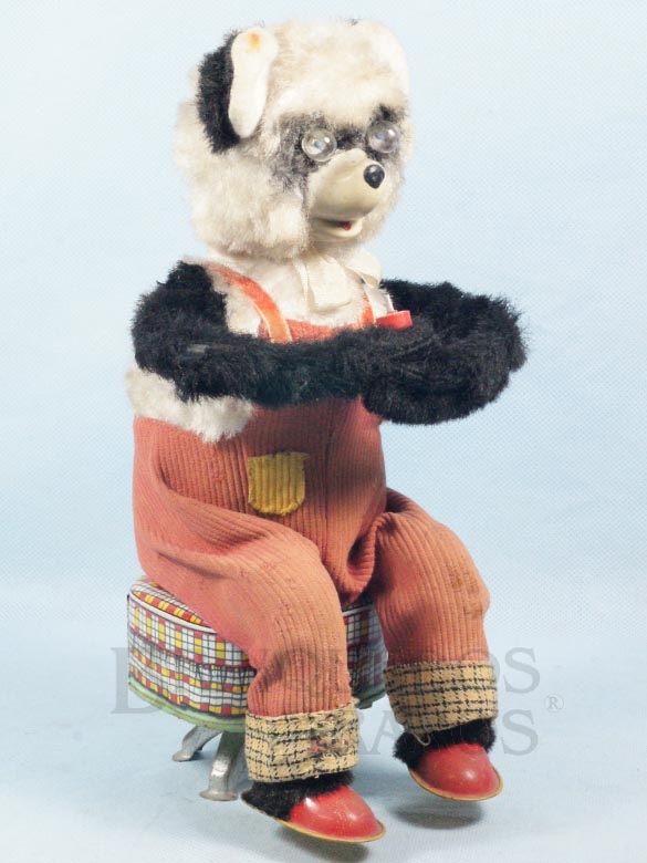 Brinquedo antigo Urso Panda sentado tocando Apito com 28,00 cm de altura Década de 1960