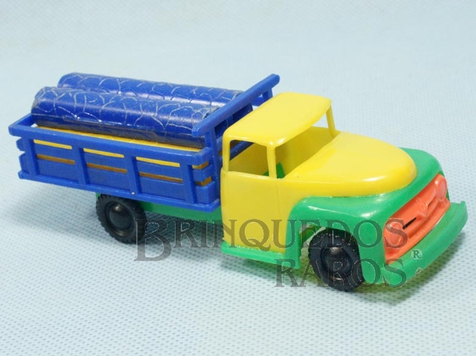 Brinquedo antigo Caminhão Ford F-350 1960 com carga de Toras 13,00 cm de comprimento Década de 1960