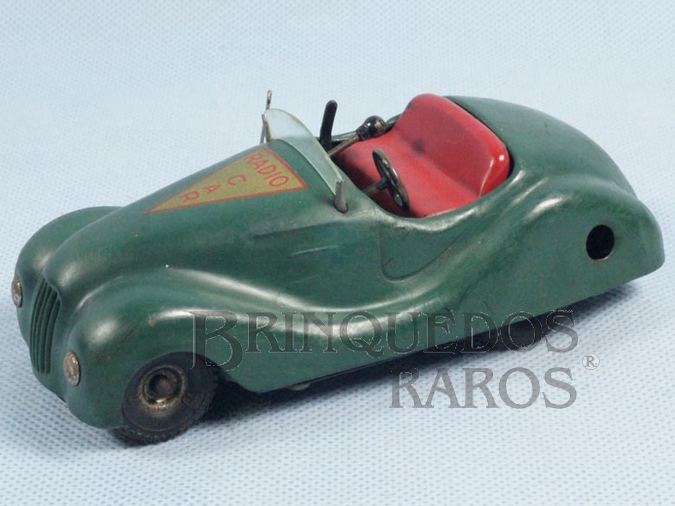Brinquedo antigo Carro Radio Car com 14,00 cm de comprimento Toca música Dois motores Década de 1950