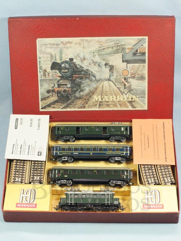 Brinquedo antigo Marklin Conjunto com Locomotiva elétrica SET800 três vagões de passageiros Trilhos e Manual de instruções Ano 1954