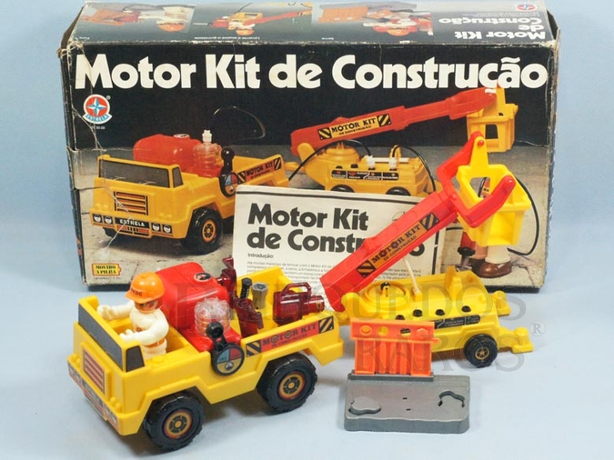 Brinquedo antigo Conjunto Motor Kit de Construção com Caminhão Reboque Boneco Ferramentas Pneumáticas e Manual de Instrução Década de 1980 