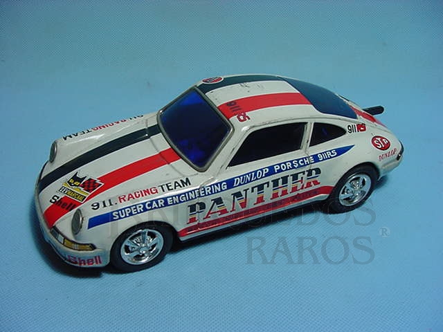 Brinquedo antigo Porsche 911 RS Rally chassi de plastico