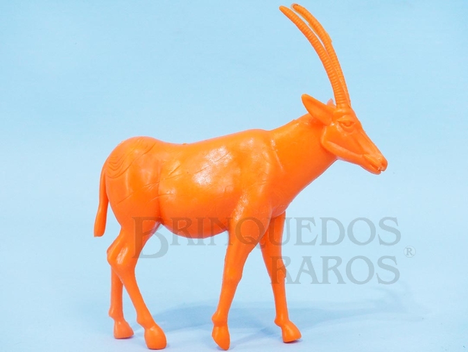 Brinquedo antigo Antílope de plástico laranja Série Zoológico Década de 1970