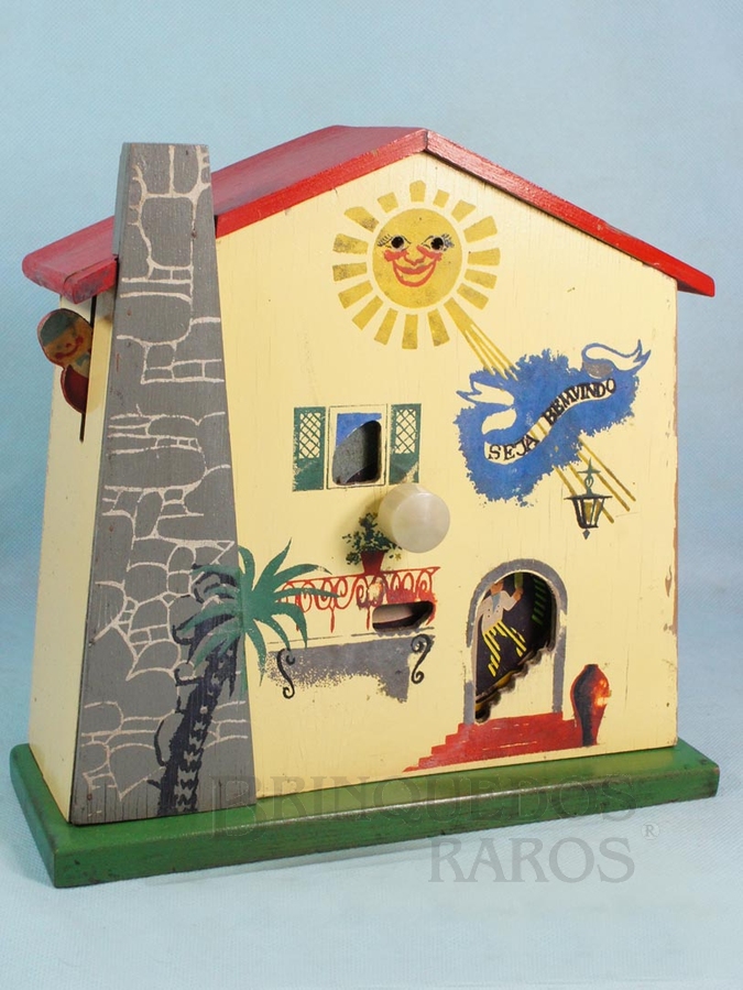 Brinquedo antigo Casa com Aparelho de música Apresenta movimento de diversos personagens em seu interior 25,00 cm de altura Melodia It´s a Small World Ano 1947