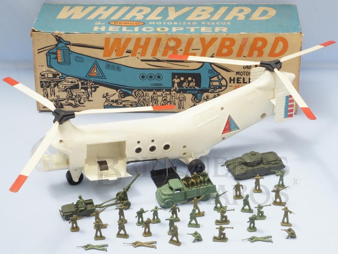Brinquedo antigo Conjunto Whirlybird com Helicóptero de Transporte de Tropas de 65,00 cm de comprimento Movimenta as hélices anda para a frente e tem guincho operacinal Acompanha Jeep com Canhão Tanque de Guerra Caminhão e 35 soldados Década 1960