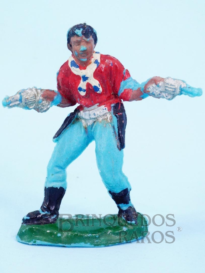Brinquedo antigo Cowboy de pé com dois revolveres de plástico azul pintado Década de 1960