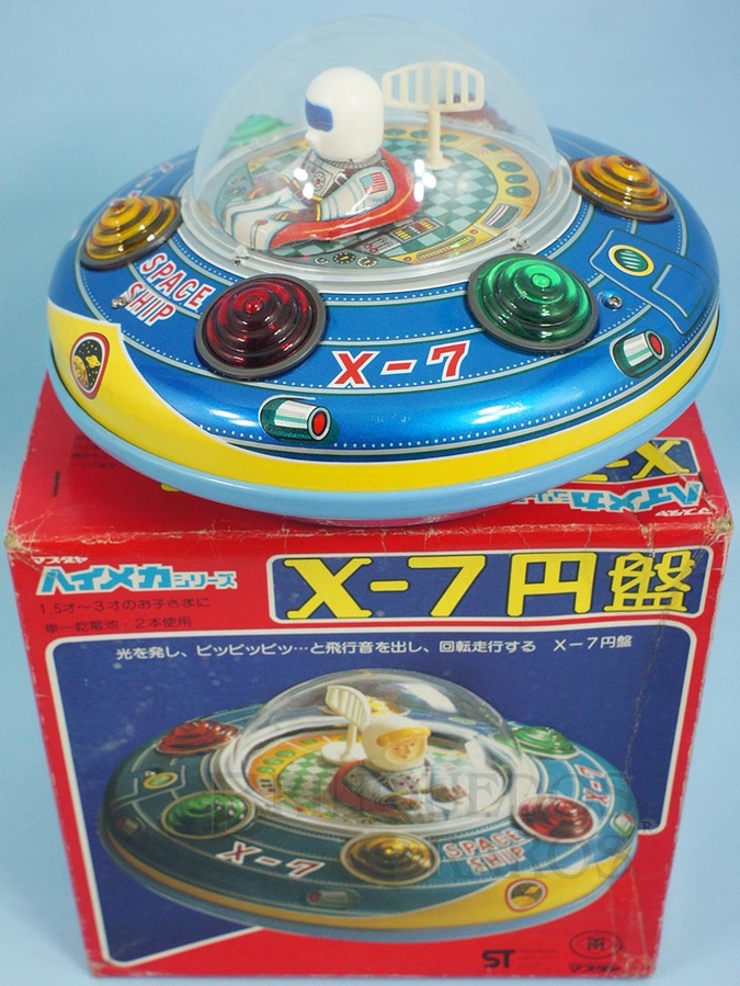 Brinquedo antigo Disco Voador X-7 Space Ship com 21,00 cm de diâmetro Sistema Bate e Volta apresenta luzes coloridas no corpo principal Década de 1980