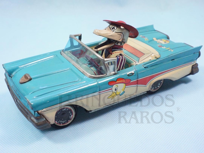 Brinquedo antigo Ford Fairlane 1961 conversível Merry Duck com Pato motorista 20,00 cm de comprimento Pato com movimentos do bico e dos braços Década de 1960
