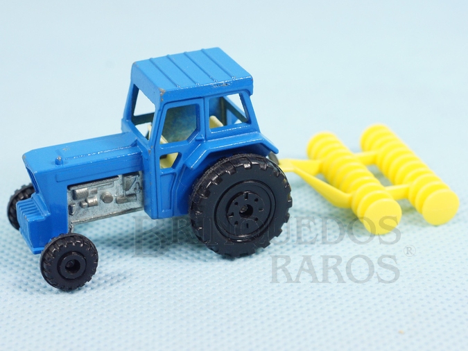 Brinquedo antigo Ford Tractor and Harrow Superfast azul