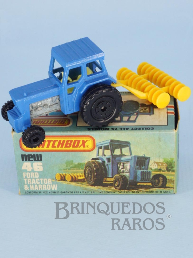 Brinquedo antigo Ford Tractor and Harrow Superfast azul