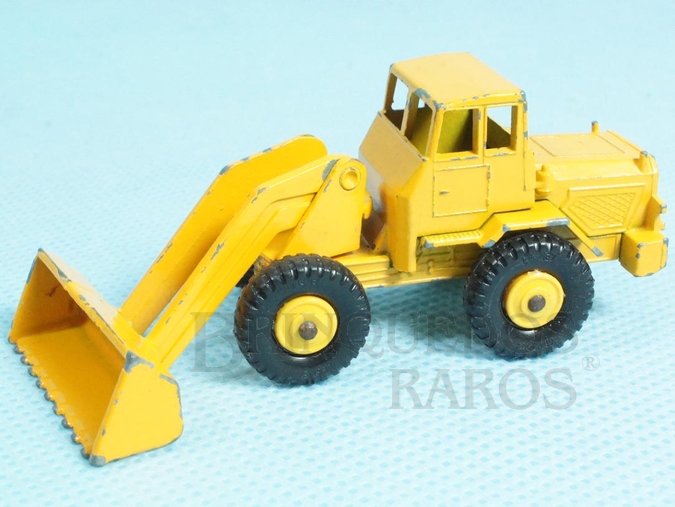 Brinquedo antigo Hatra Tractor Shovel black plastic Regular Wheels amarelo