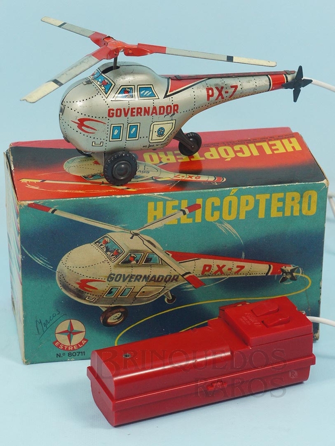 Brinquedo antigo Helicóptero Governador PX-7 com 16,00 cm de comprimento Anda para frente para trás e movimenta a hélice com Controle Remoto via cabo Ano 1969