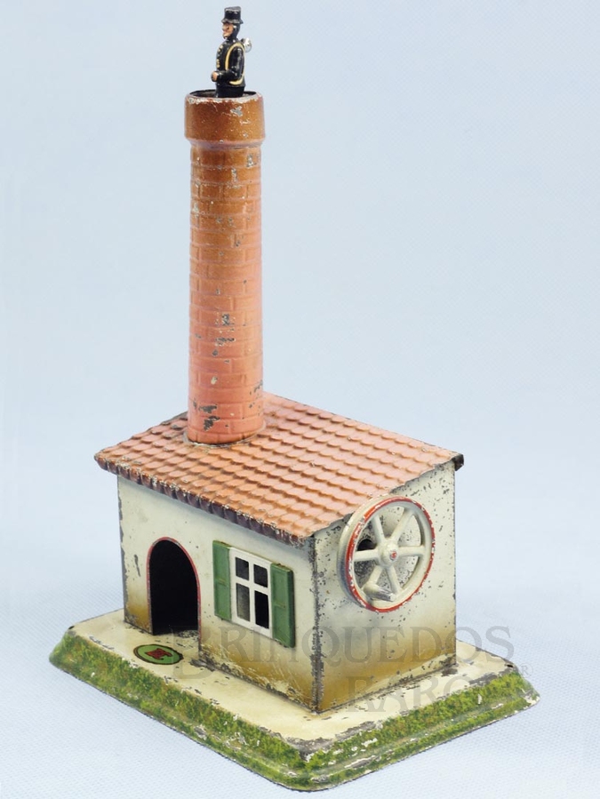 Brinquedo antigo Limpador de Chaminé personagem folclórico Europeu com 25,00 cm de altura fabricado pela Doll Alemanha em lata Brinquedo movido por uma Caldeira à Vapor Década de 1920.