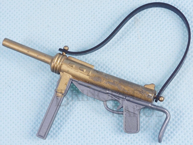Brinquedo antigo Metralhadora de mão cinza e dourada Edição 1978