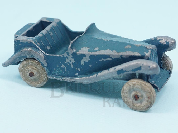 Brinquedo antigo MG Record com 8,00 cm de comprimento e rodas de pedra Década de 1940


