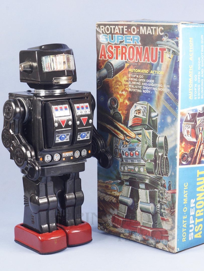 Brinquedo antigo Robot com metralhadora no peito 29,00 cm de altura Rotate-O-Matic Super Astronaut rosto humano Década de 1960