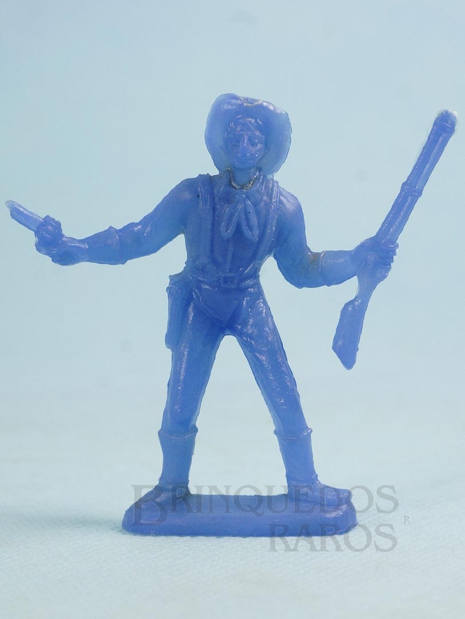 Brinquedo antigo Soldado da Sétima Cavalaria de pé com rifle e revolver Plástico azul Década de 1980