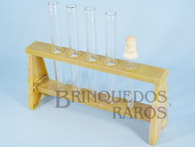 Brinquedo antigo Suporte de plástico marmorizado com 4 Tubos de ensaio de vidro e um Conta-gotas para Conjunto de Química Década de 1960