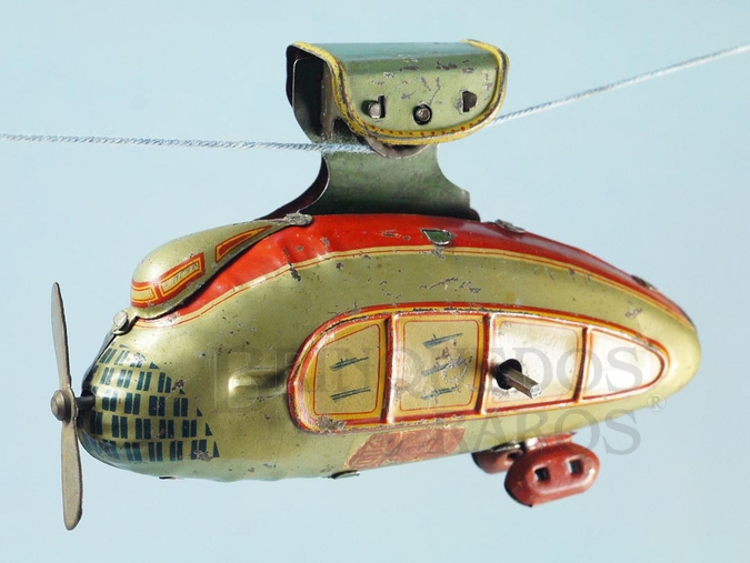 Brinquedo antigo Teleférico Futurista com 12,00 cm de comprimento Move a hélice e se movimenta através de um cabo Década de 1930 